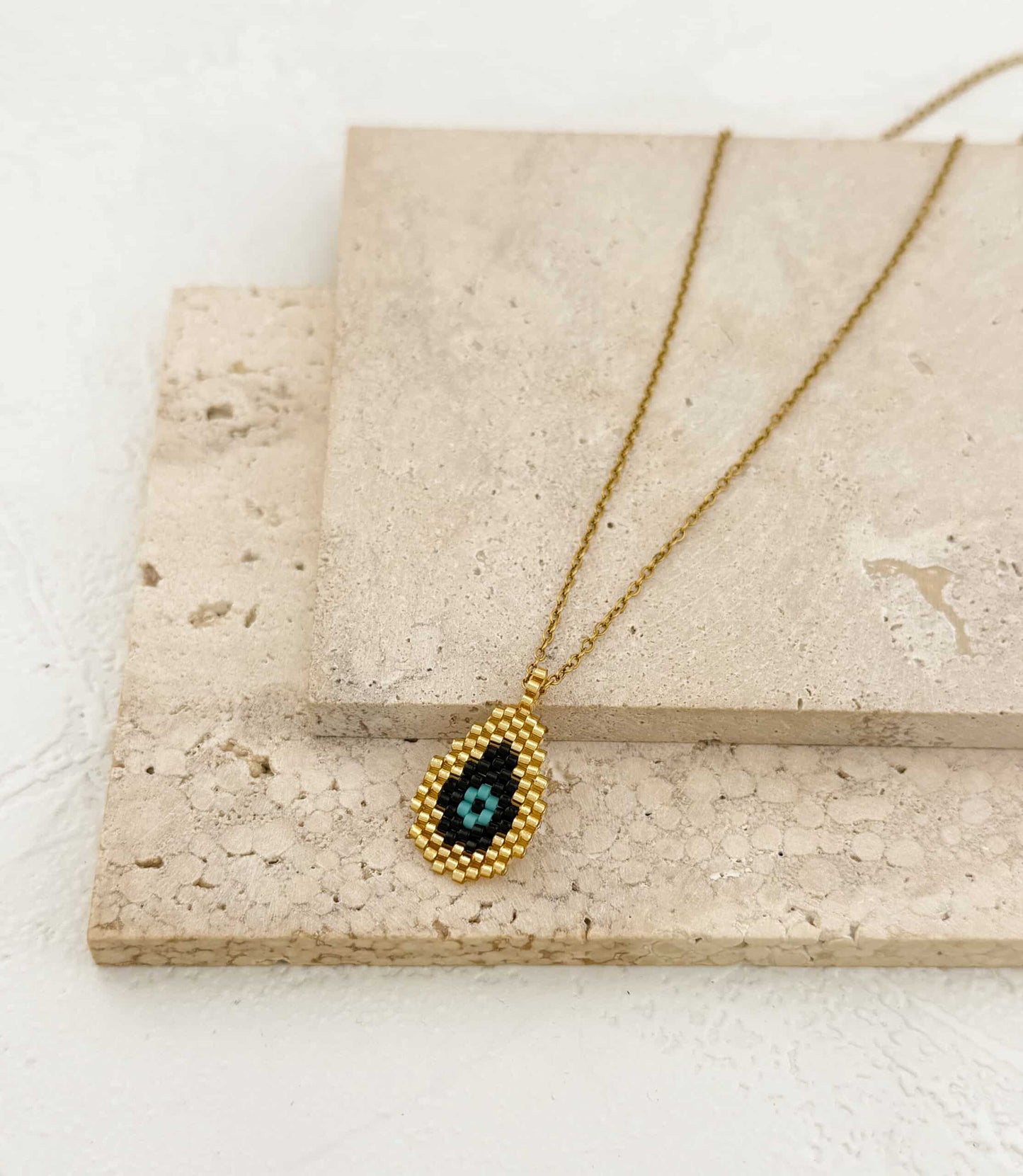 Gold mijuki black drop necklace